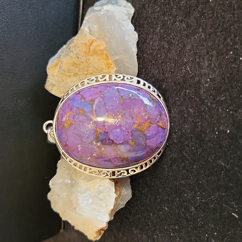 Purple copper turquoise cabochon set in silver filigree pendant